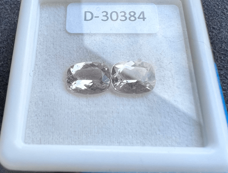 morganite pink stone in white box on neutral background to illustrate a pink stone
