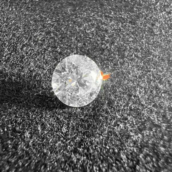 CZ or cubic zirconia stone cut on a neutral background to illustrate the zircon.