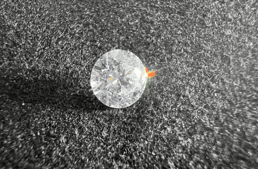 CZ or cubic zirconia stone cut on a neutral background to illustrate the zircon.